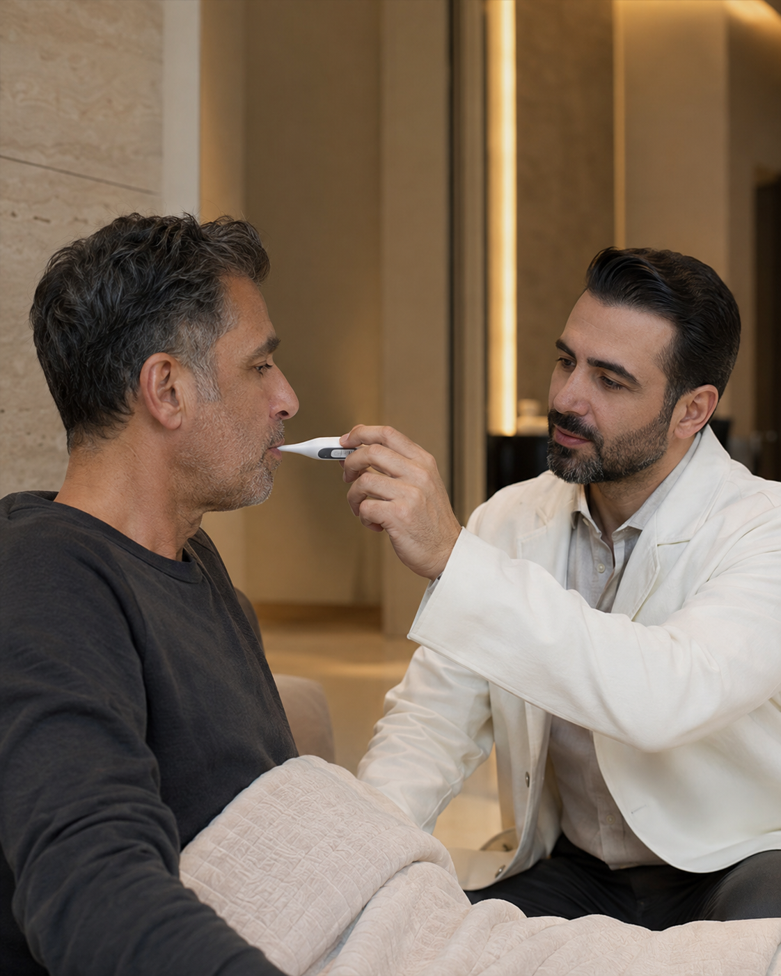 Doctor checking a patient's temperature during a home visit