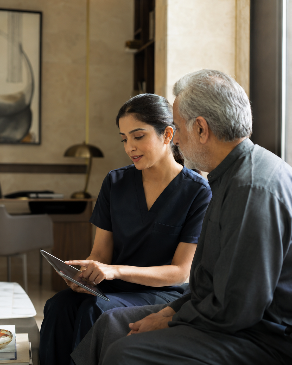 Home nurse reviewing a coordinated long-term care plan